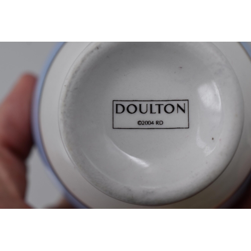 318 - 19 Pieces Pale Blue and White Pottery by Doulton