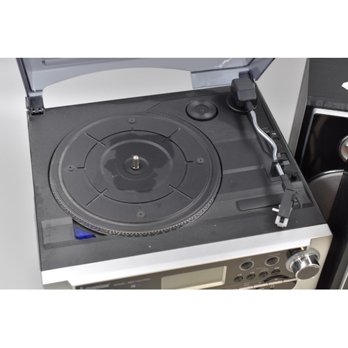 641 - A Steepletone 6-In-1 Music System (SMC1033 Pro) With Intrustions, Remote and Speaker. Powers on When... 