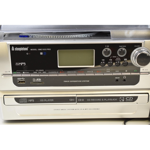 641 - A Steepletone 6-In-1 Music System (SMC1033 Pro) With Intrustions, Remote and Speaker. Powers on When... 