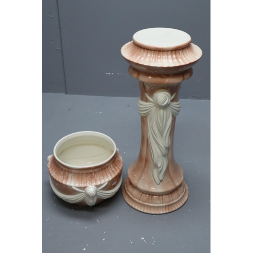 645 - A Classical Style Pink Marble Effect Ceramic Jardinere With Stand. Approx 35.5