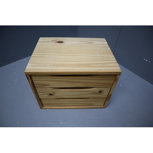 649 - Three drawer pine storage unit measures 15