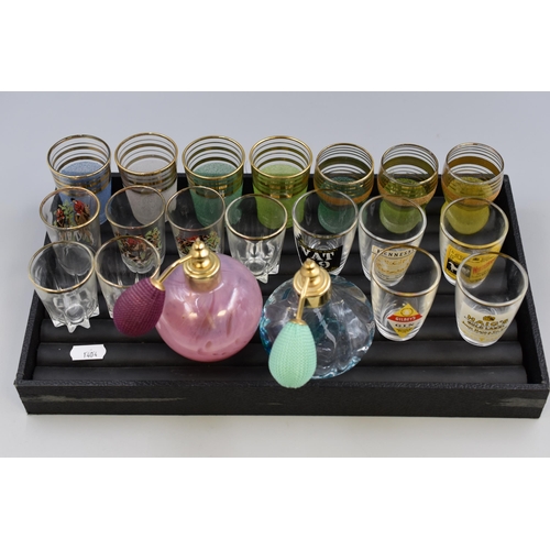 235 - A Selection of Eighteen Collectable Shot Glasses, With Two Perfume Atomisers (One is Caithness)