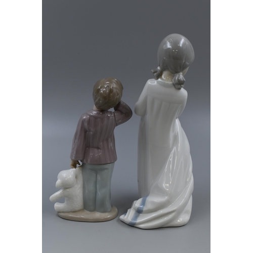 242 - Two Nao By Lladro Porcelain Figures Depicting Children. Includes Boy With Teddy Bear and Other. Tall... 