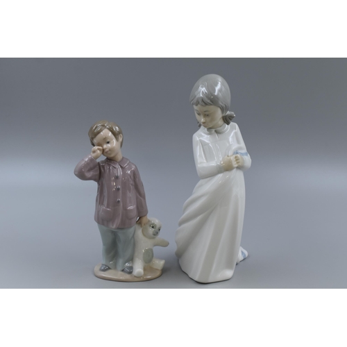 242 - Two Nao By Lladro Porcelain Figures Depicting Children. Includes Boy With Teddy Bear and Other. Tall... 