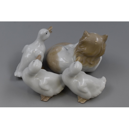 243 - Four Nao Porcelain Animal Figures. Includes Kitten and Three Goslings. All Are AF