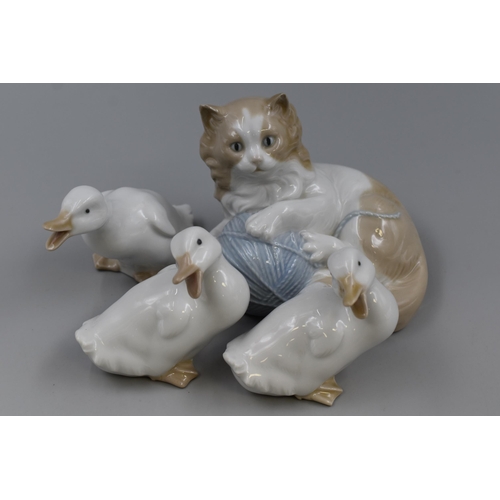 Four Nao Porcelain Animal Figures. Includes Kitten and Three Goslings. All Are AF