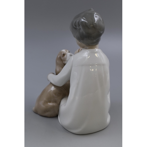 251 - A Lladro Boy With Dog Spanish Porcelain Figure, Approx 8