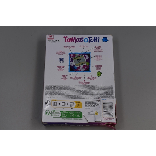 381 - A Boxed Bandai Tamagotchi