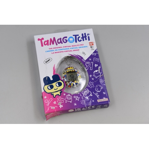 381 - A Boxed Bandai Tamagotchi