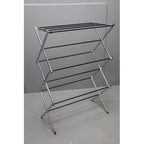 684 - A New Chrome Metal Folding Clothes Airer