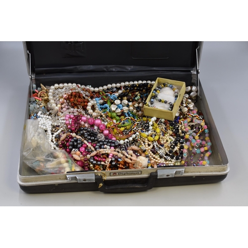 426 - Vintage Briefcase full of Unsorted Jewellery