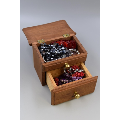 432 - A Wooden Jewellery Box Containing A Selection of Unsorted Designer Jewellery