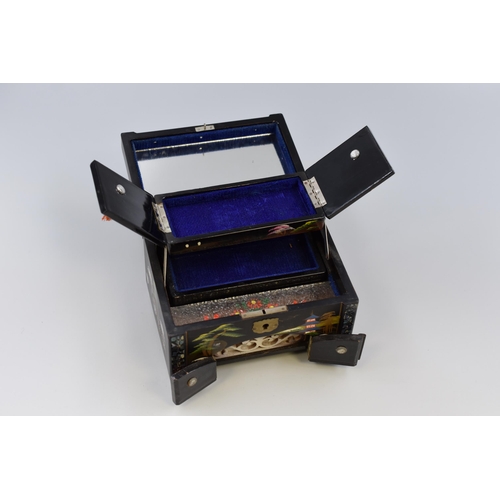 436 - A Japanese Lacquer and Mother of Pearl Inlaid Musical Jewellery Box