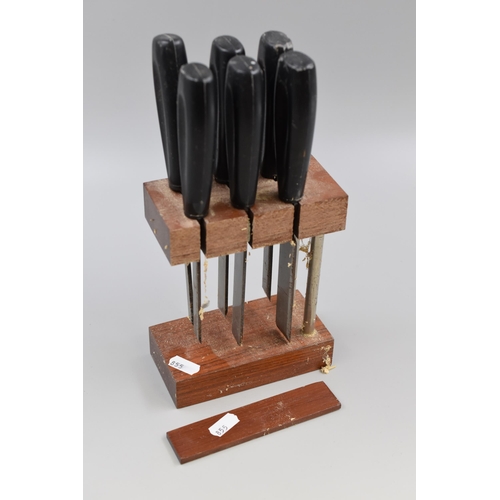 719 - Six Quality Unbranded Wood Chisels in a Hand made Stand