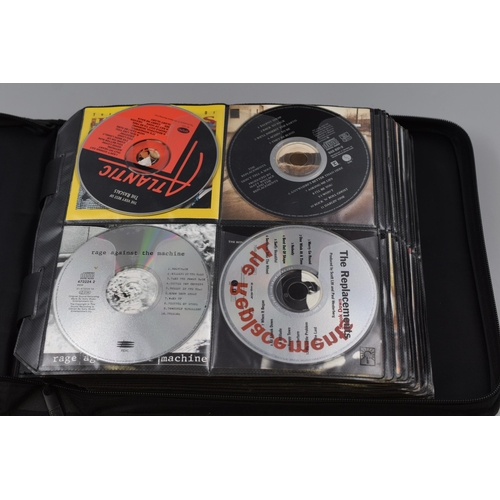 468 - Three CD Cases To Contain A Large Selection of Assorted CD's. Includes Bruce Springsteen, Prince, Ni... 