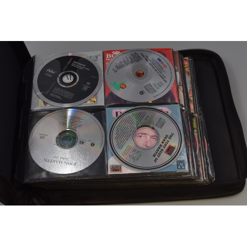 468 - Three CD Cases To Contain A Large Selection of Assorted CD's. Includes Bruce Springsteen, Prince, Ni... 