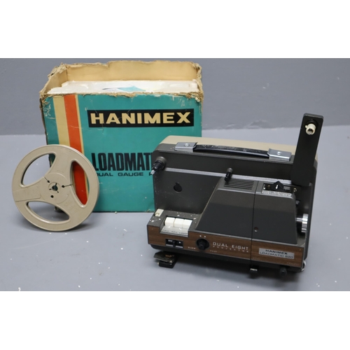 574 - Hanimex Loadmatic 820 Dual Gauge Projector in Box (untested)