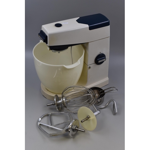 579 - A Kenwood Major Kitchen Mixer, With Attachments. Powers on When Tested