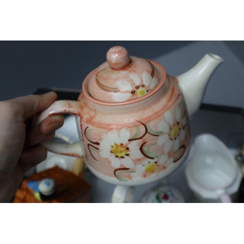 897 - Mixed Lot includes Apple Tea Pot, Handpainted Tea Pot,. Bird Tea Pot, Andy Capp Toast Rack and more