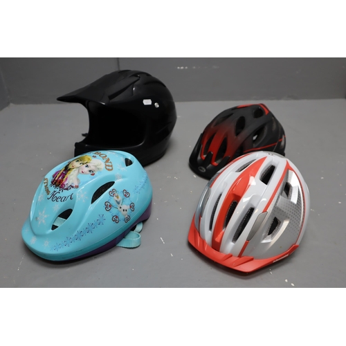 756 - Four Helmets, includes 3 Childrens Helmets, (one lights up) and an Adult Helmet