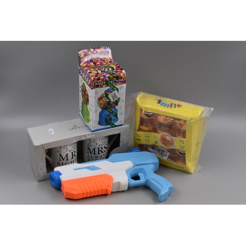 823 - A Mixed Selection To Include Water Pistol, Candy Machine, Boxed Mug Set, And Other