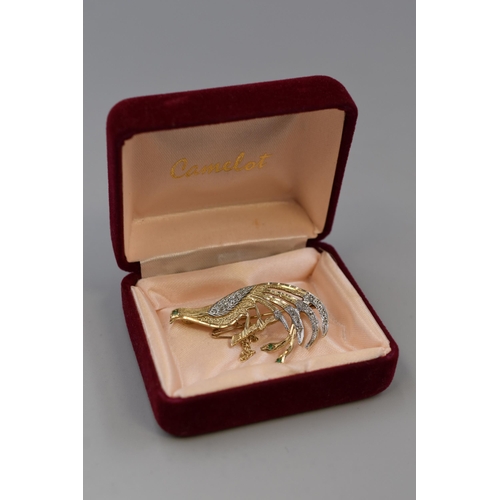 1 - Hallmarked Gold 375 (9ct) Peacock Brooch decorated with Diamond and Emerald (5cm)