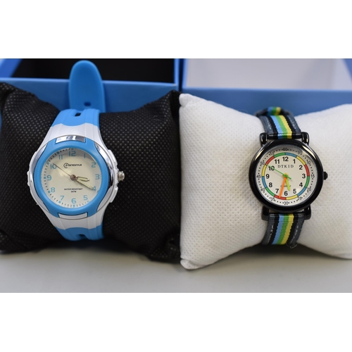 103 - Two childrens watches one in blue and silver one in black with multicoloured strap both boxed and br... 