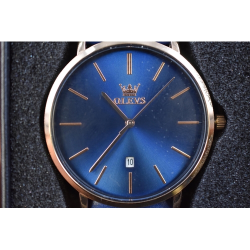 106 - Stylish gents Olev watch in rose gold with dark blue strap, brand new in presentation box with tags ... 