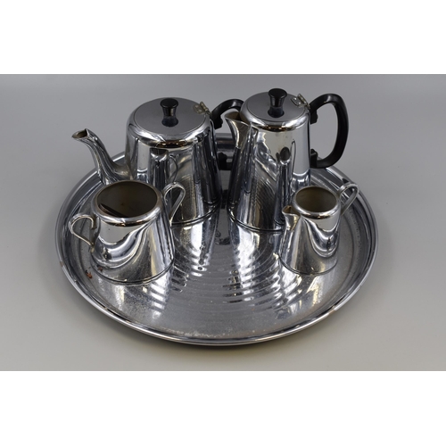 409 - A Golf Brand Five Piece Retro Stainless Steel Tea/Coffee Set, With Pair of Sugar Tongs