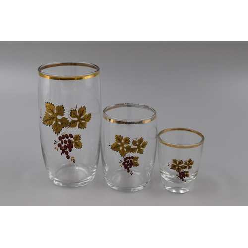 171 - A Set of Eighteen Gold Gilt Rim Grape Design Drinking Glasses, Three Different Sizes