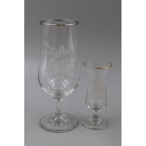 172 - A Set of Twelve Etched Strawberry Design Drinking Glasses, In Two Sizes