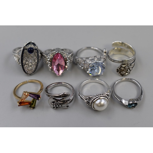 197 - A Selection of Eight Designer Rings. Includes Electric Guitar, Mother of Pearl Stoned and More