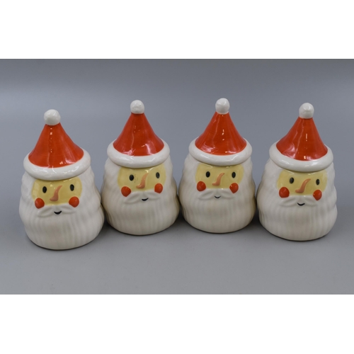 216 - Four Father Christmas Lidded Condiment Pots