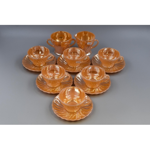 329 - An Anchor Hocking of USA Sixteen Piece 'Fire-King' Glass Tea Set