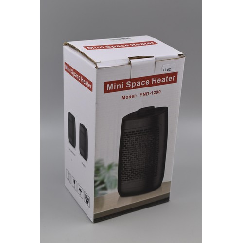 362 - Brand New Boxed Electric Mini Space Heater with Variable Heat Control.