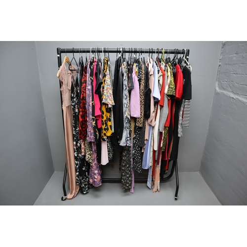 596 - Selection of Ladies Fashion Clothing in Sizes 6 to 12 (Clothes Rail Not Included)