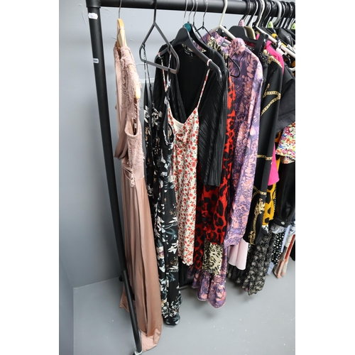 596 - Selection of Ladies Fashion Clothing in Sizes 6 to 12 (Clothes Rail Not Included)