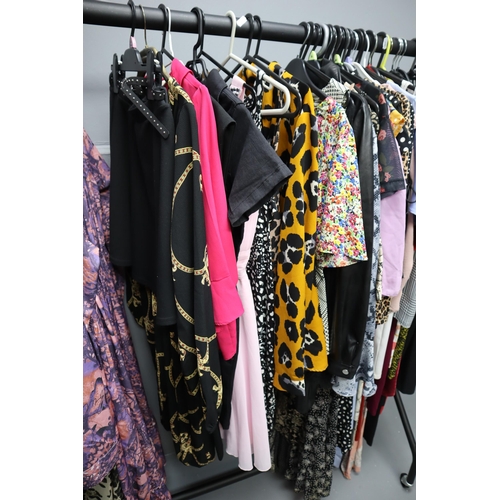 596 - Selection of Ladies Fashion Clothing in Sizes 6 to 12 (Clothes Rail Not Included)