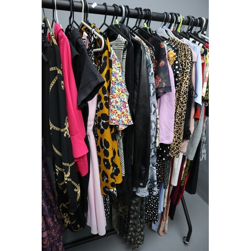 596 - Selection of Ladies Fashion Clothing in Sizes 6 to 12 (Clothes Rail Not Included)