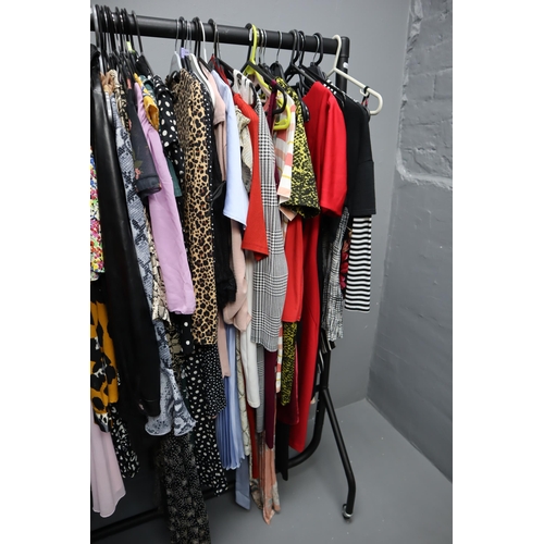 596 - Selection of Ladies Fashion Clothing in Sizes 6 to 12 (Clothes Rail Not Included)