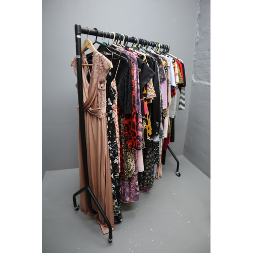 596 - Selection of Ladies Fashion Clothing in Sizes 6 to 12 (Clothes Rail Not Included)