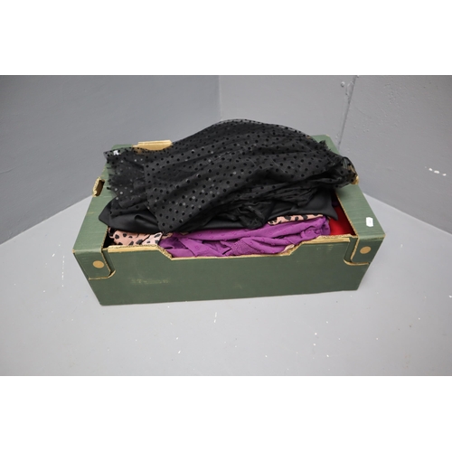 597 - Large Selection of Ladies Clothing in Various Sizes (Approx. 16 items). With Coat Hangers