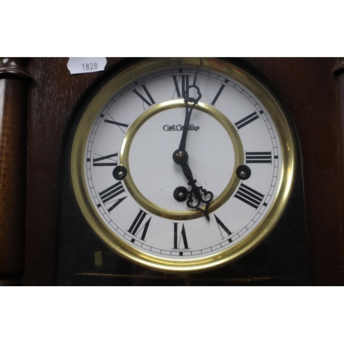 391 - A W M Widdop Wood Cased Wall Clock, With Key. Approx 28” Tall. Untested