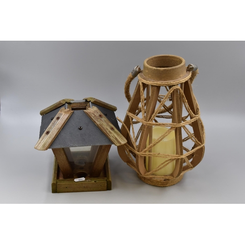 397 - Two items to include Bird Feeder and Battery Hurricane Lantern