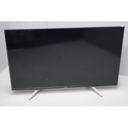 511 - Sony Bravia 49” Ultra HD 4K TV Model KD49XF8796 with Remote (powers on). Plus Sagemcom Freevie... 