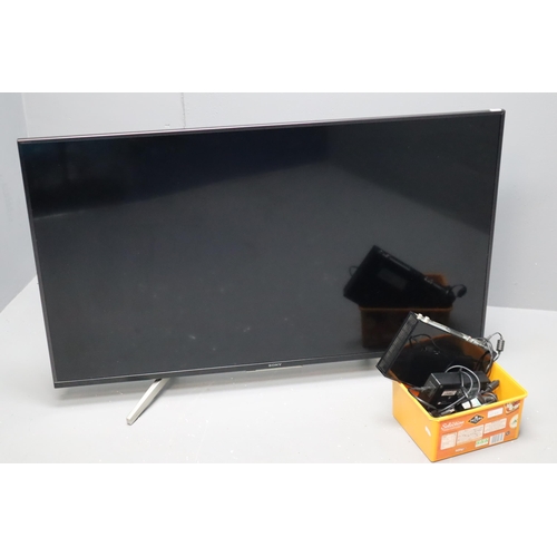 511 - Sony Bravia 49” Ultra HD 4K TV Model KD49XF8796 with Remote (powers on). Plus Sagemcom Freevie... 