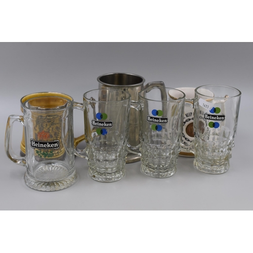 769 - A Selection of Drinking Tankards To Include Heineken, Guinness, Pewter Tankard and More