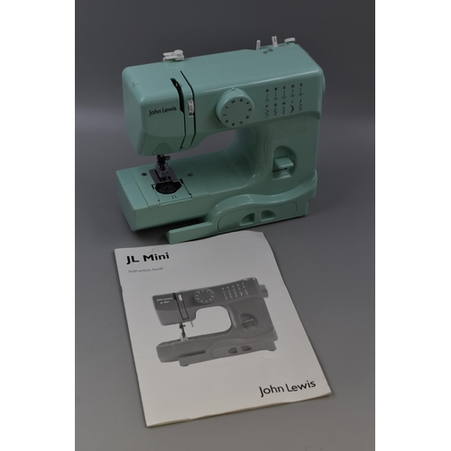 552 - John Lewis JL Mini Sewing Machine with Paperwork, Foot pedal and Box (Working)