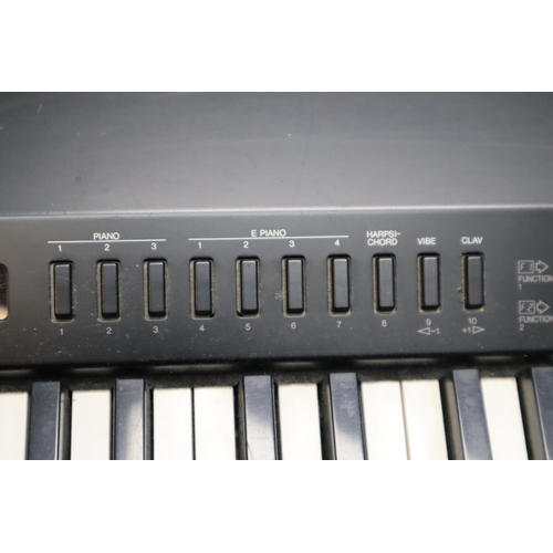 559 - Yamaha Pf70 Electronic Piano comes with Protective Case (Powers On When Tested) Approx 52