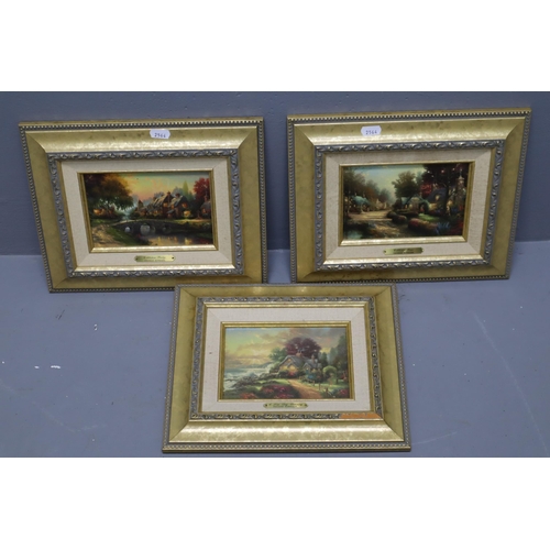 512 - Three Framed Thomas Kinkade Prints. Includes 'Cobblestone Lane', 'A New Day Dawning', And 'Cobblesto... 